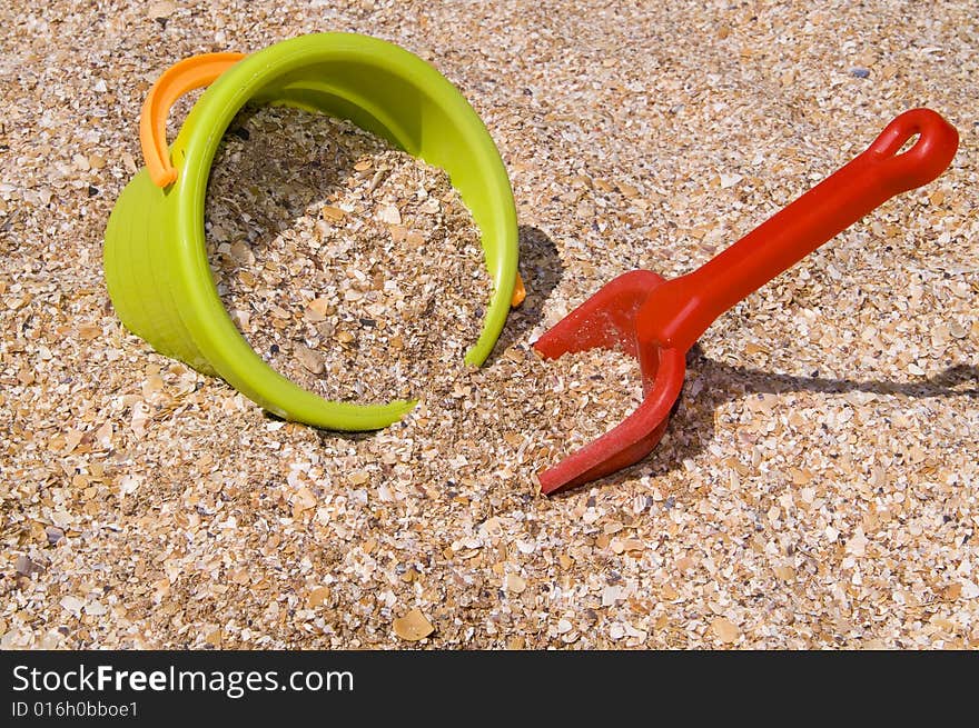 Bucket and shovel (beach background). Bucket and shovel (beach background)