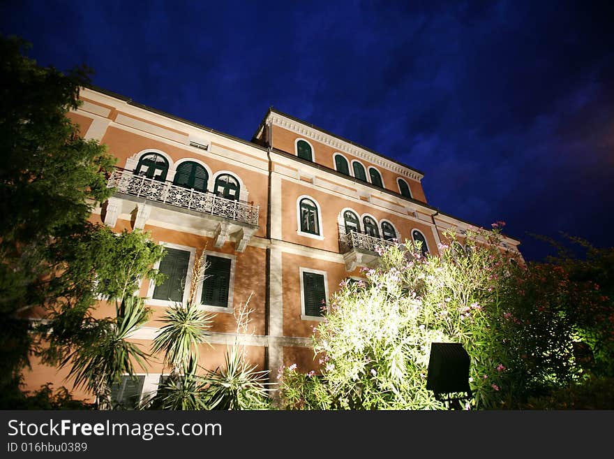 House facade illuminated at night in Rovinj in Croatia