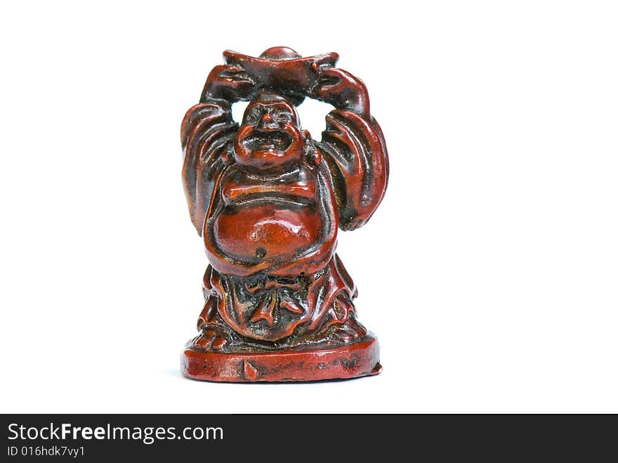 Brown statuette of east god from a stone on a white background