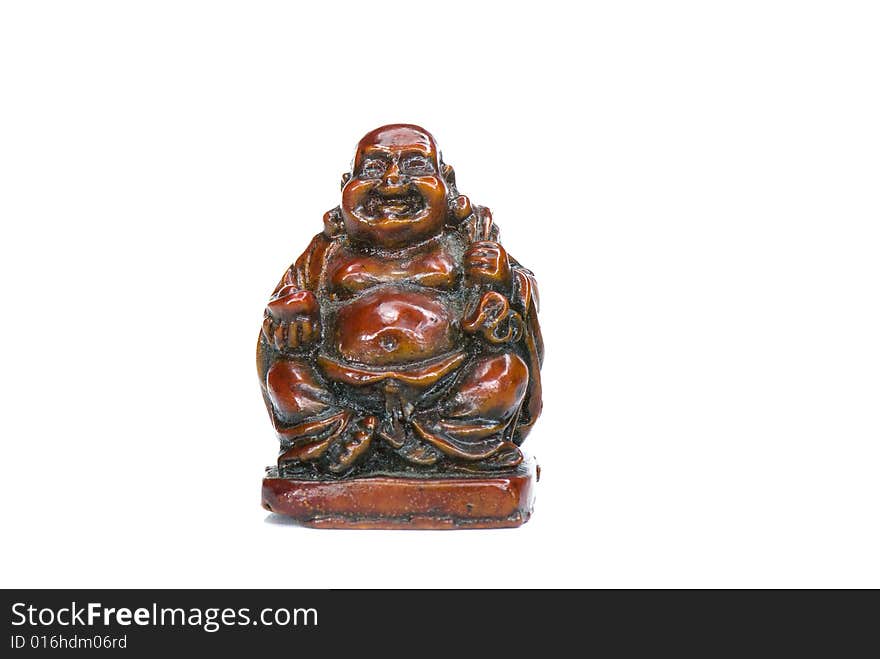 Brown statuette of east god from a stone on a white background