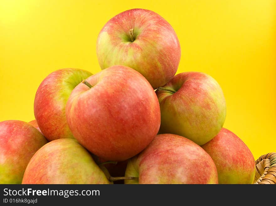 Harvesting. A basket with red ripe apples..