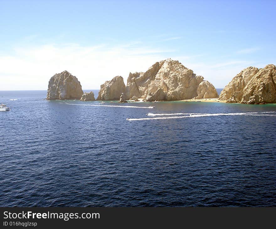 This shot is taken looking out of Cabo San Lucas. We are ported in the bay on a cruise ship. Just an exhilirating shot. This shot is taken looking out of Cabo San Lucas. We are ported in the bay on a cruise ship. Just an exhilirating shot.