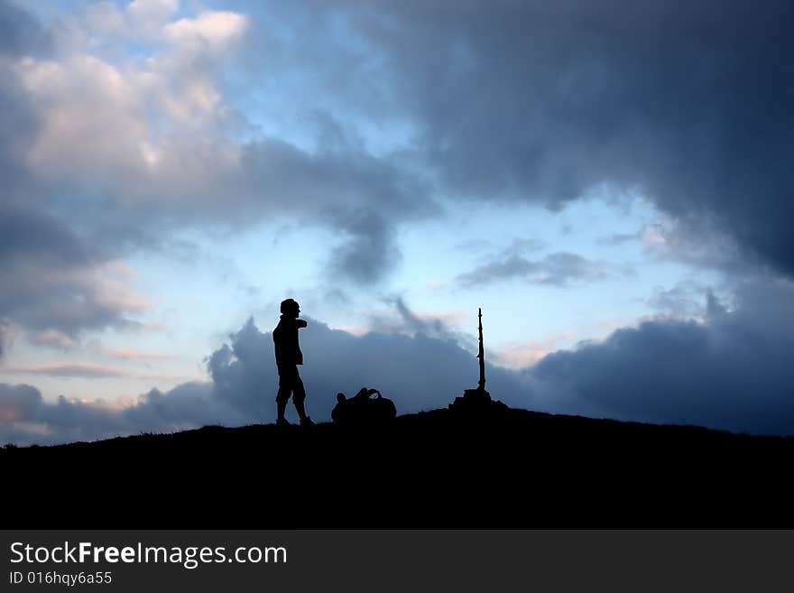 The tourist on mountain Tataruka shows where to go further. The tourist on mountain Tataruka shows where to go further