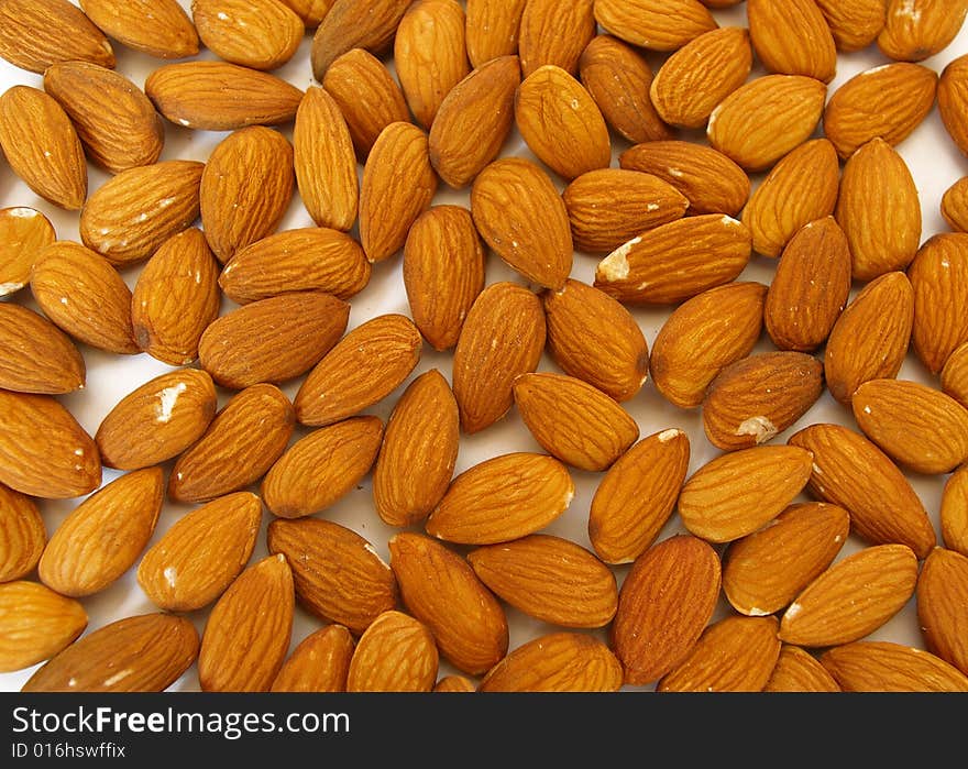 Peeled almonds background