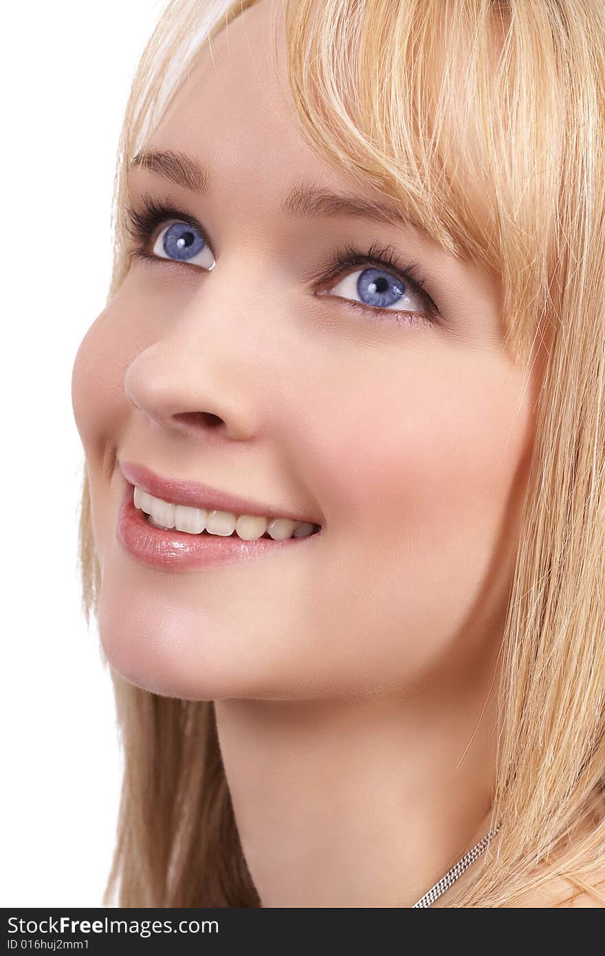 Portrait of a beautiful blonde woman with light blue eyes and natural make-up isolated on white background. Portrait of a beautiful blonde woman with light blue eyes and natural make-up isolated on white background