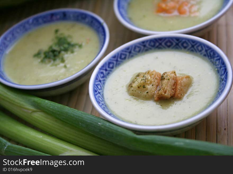 Some fresh soup of zucchinis in bowls