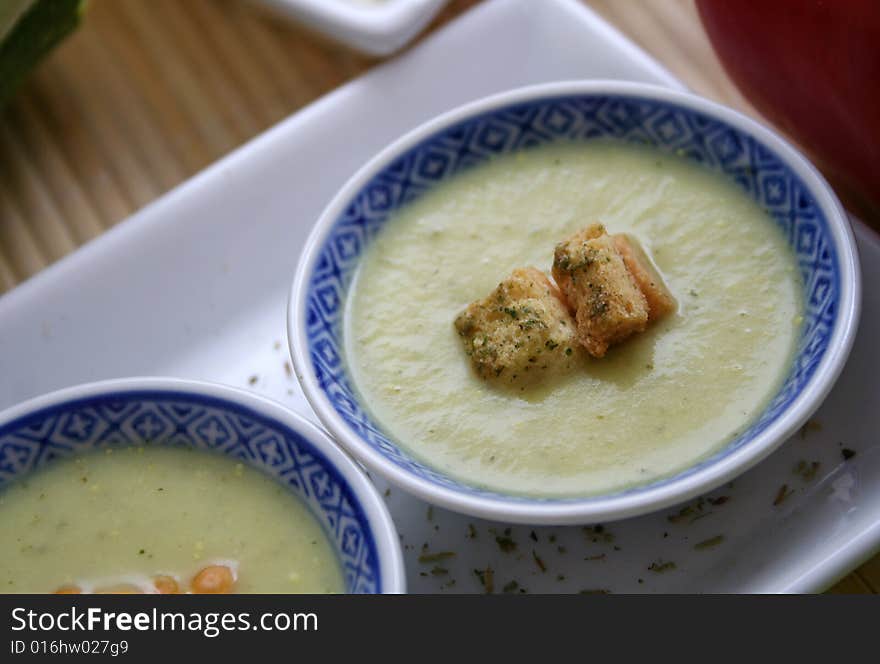 Some fresh soup of zucchinis in bowls