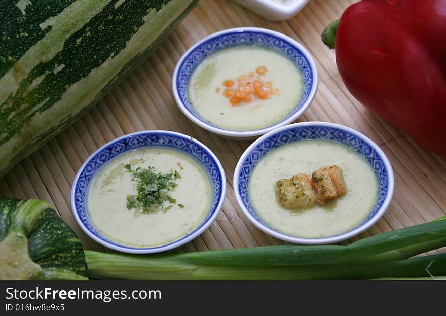 Some fresh soup of zucchinis in bowls