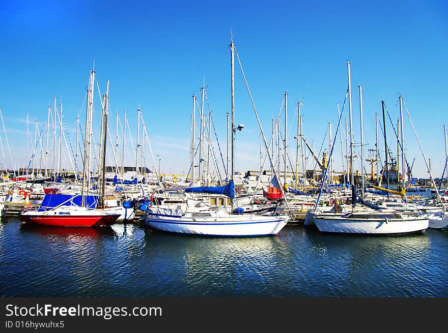 Yachts on sunny bay