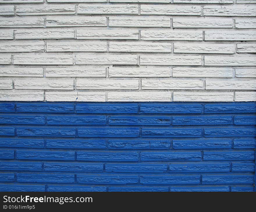 White and blue brick building