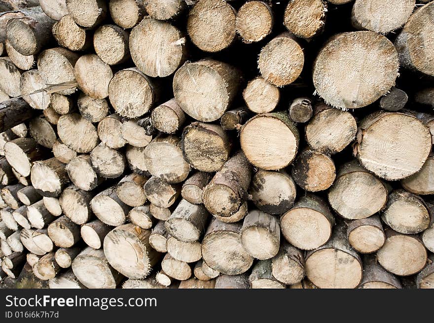 Skew view of many woodpiles in stack. Skew view of many woodpiles in stack