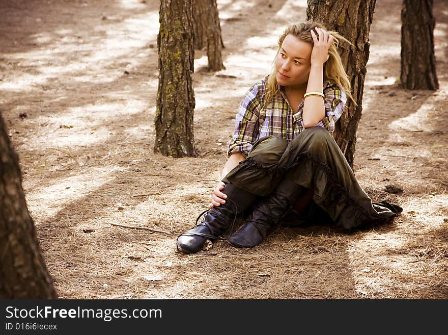 Woman In Autumn Forest