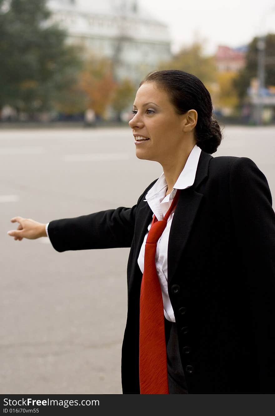 Hitchhiking Businesswoman