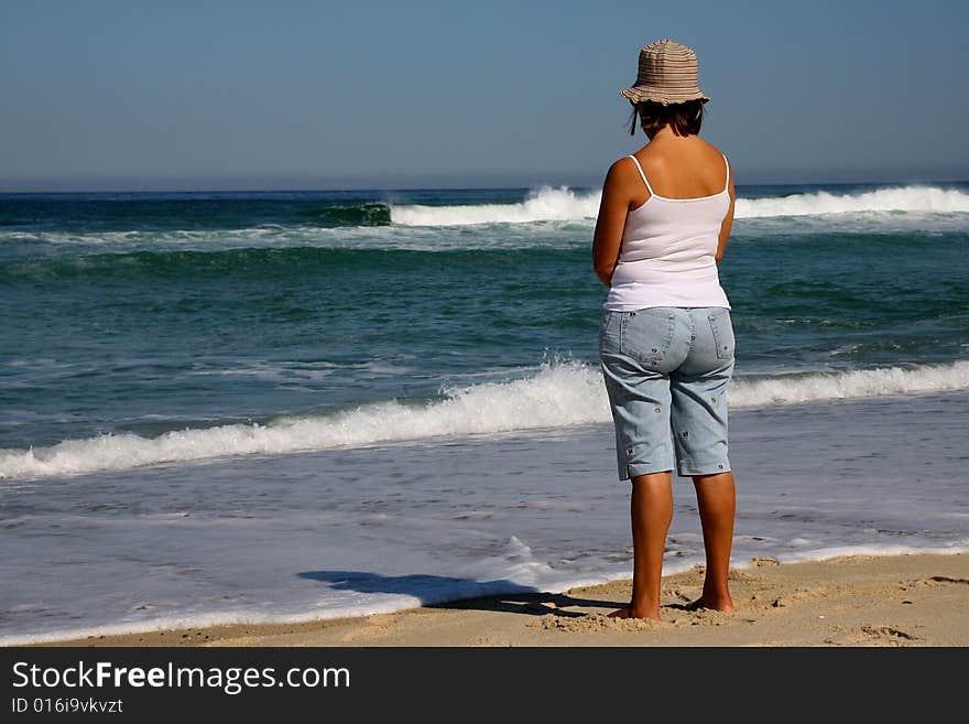 Woman on the beach to relax the continent