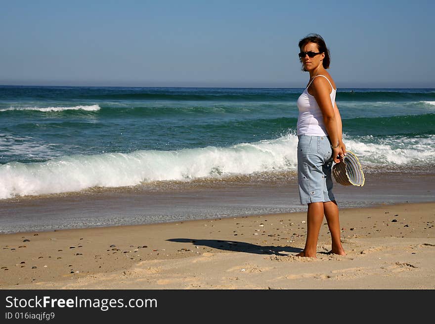 Person the edge of the beach woman the feet