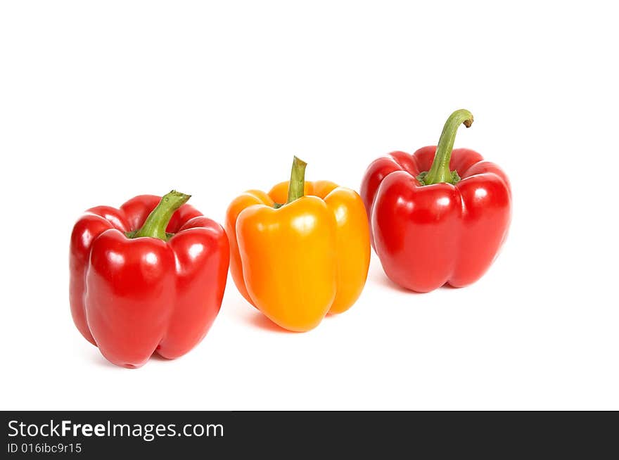 Three red peppers isolated on a white background. Three red peppers isolated on a white background.