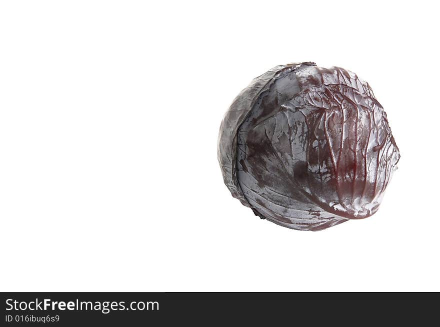 Blue cabbage isolated on a white background. Blue cabbage isolated on a white background.