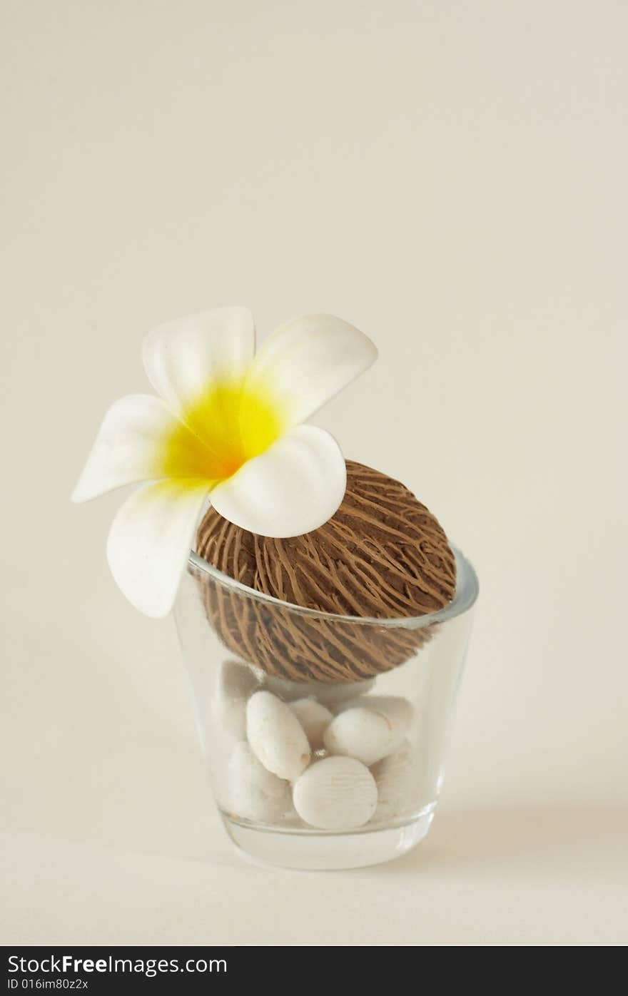 Frangipani with glass and white rock. Frangipani with glass and white rock.