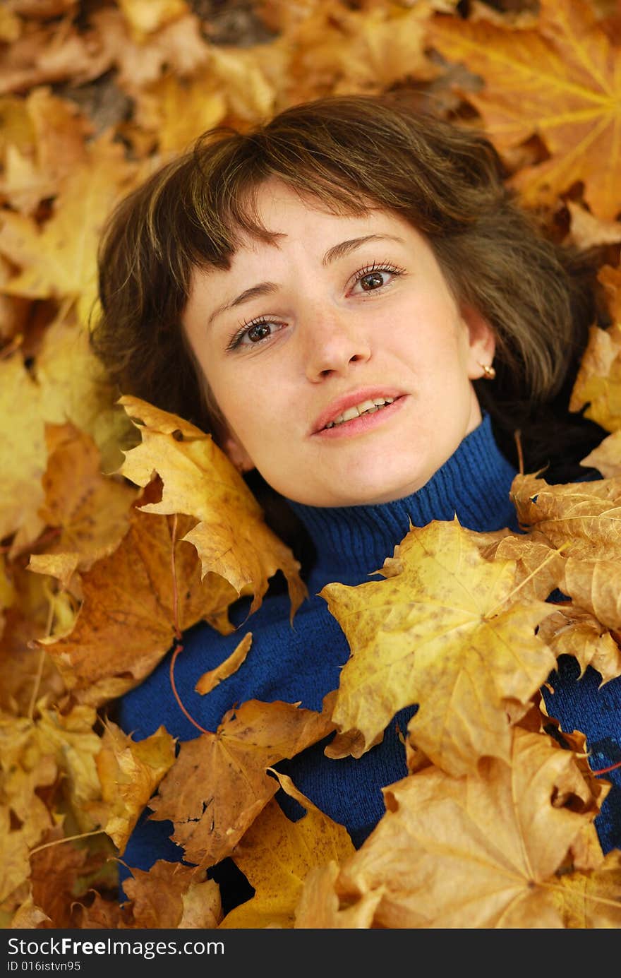 The girl and autumn leaves. A season - autumn, age of 26 years