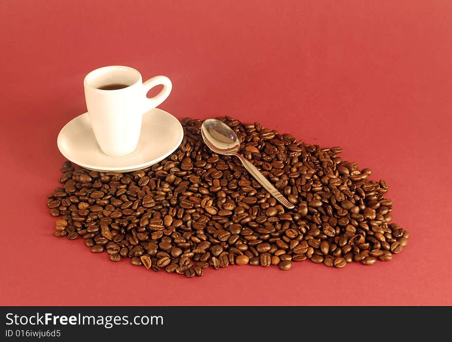 A studio shot series related to coffee - roasted beans with various cups and different backgrounds