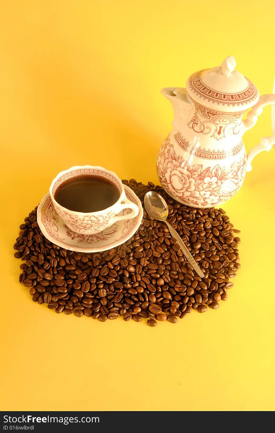 A studio shot series related to coffee - roasted beans with various cups and different backgrounds