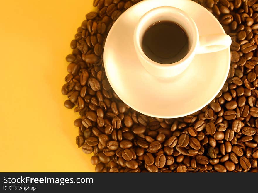 A studio shot series related to coffee - roasted beans with various cups and different backgrounds