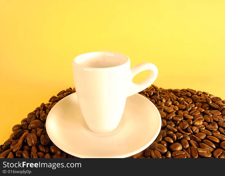 A studio shot series related to coffee - roasted beans with various cups and different backgrounds