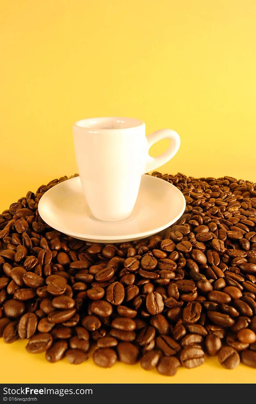 A studio shot series related to coffee - roasted beans with various cups and different backgrounds