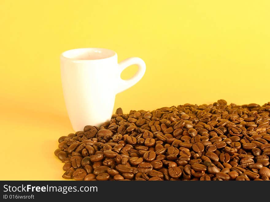 A studio shot series related to coffee - roasted beans with various cups and different backgrounds