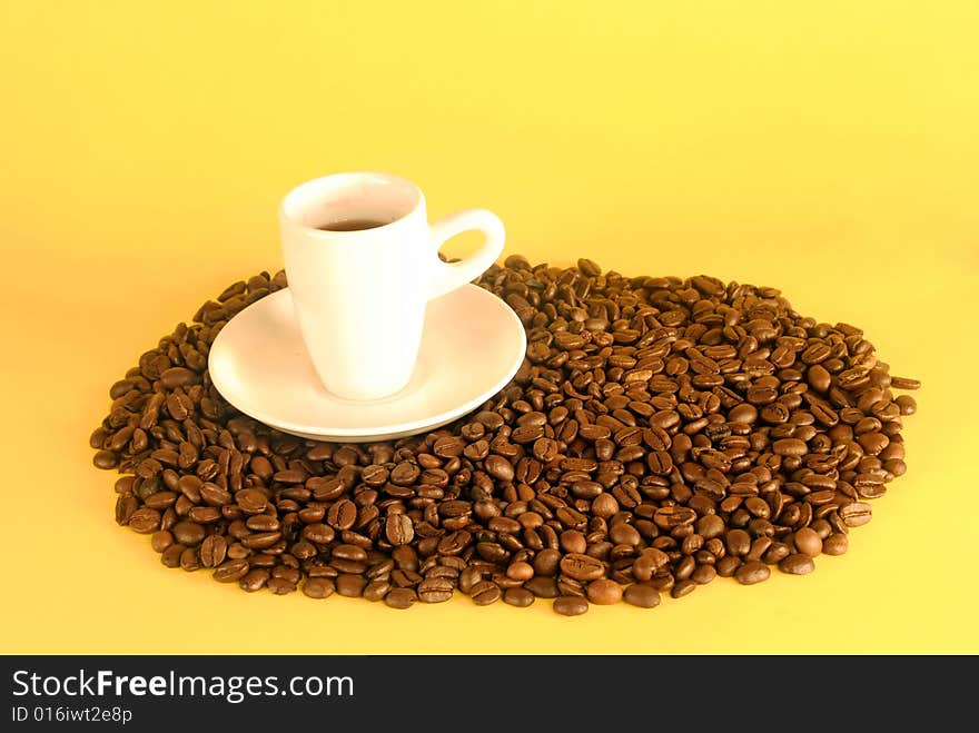 A studio shot series related to coffee - roasted beans with various cups and different backgrounds