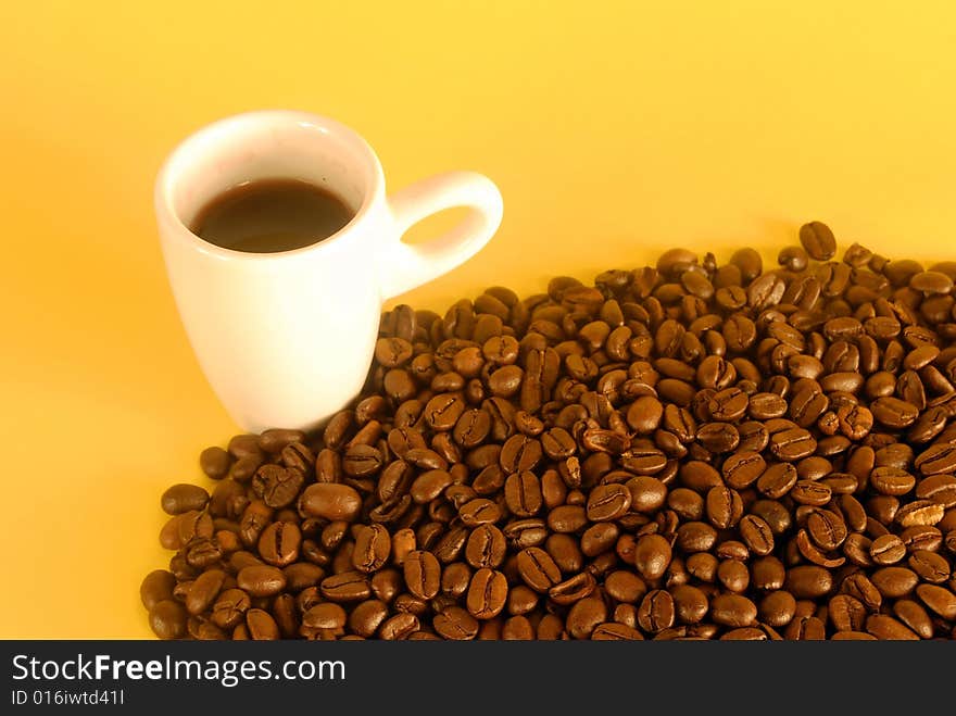 A studio shot series related to coffee - roasted beans with various cups and different backgrounds