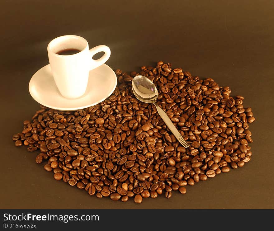 A studio shot series related to coffee - roasted beans with various cups and different backgrounds