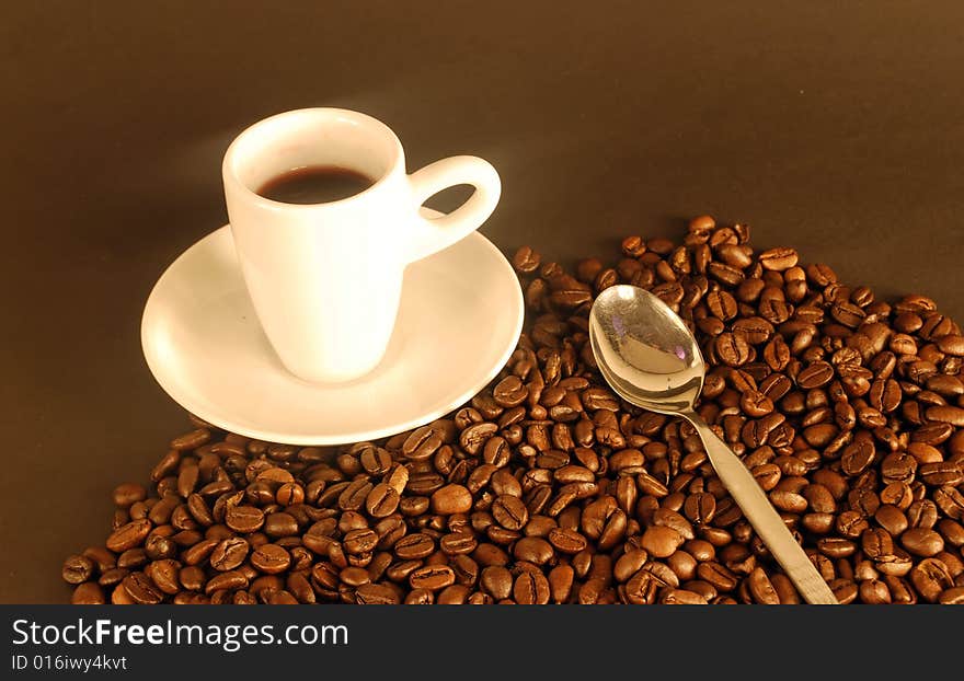 A studio shot series related to coffee - roasted beans with various cups and different backgrounds