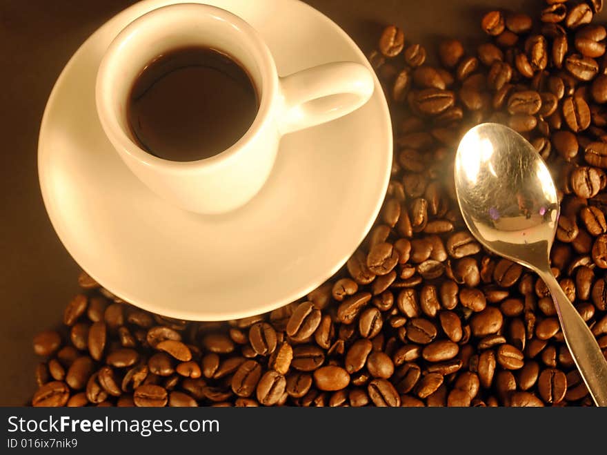 A studio shot series related to coffee - roasted beans with various cups and different backgrounds