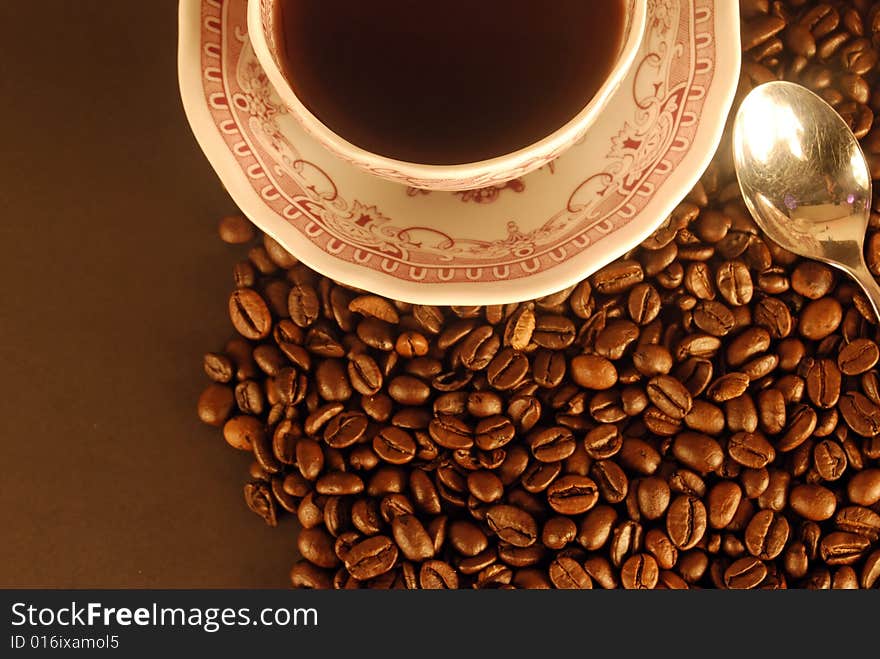 A studio shot series related to coffee - roasted beans with various cups and different backgrounds