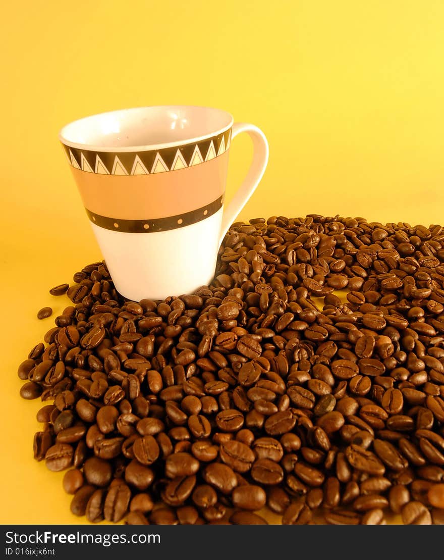 A studio shot series related to coffee - roasted beans with various cups and different backgrounds