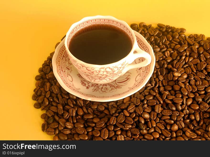 A studio shot series related to coffee - roasted beans with various cups and different backgrounds