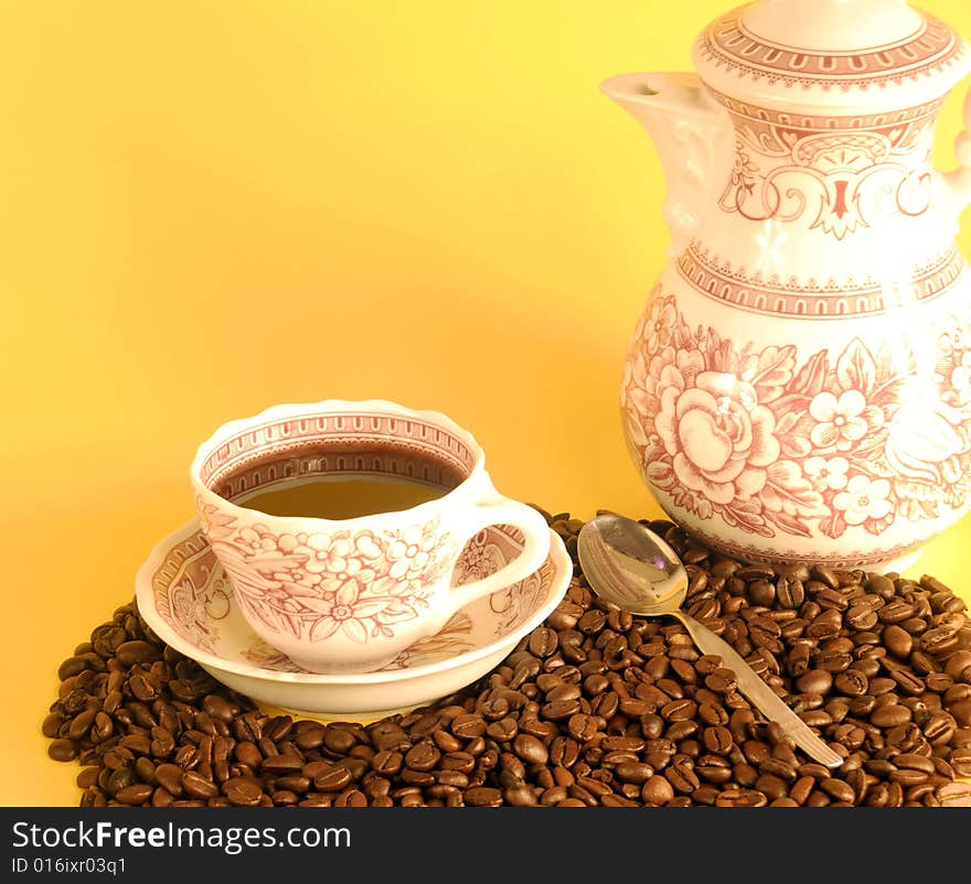 A studio shot series related to coffee - roasted beans with various cups and different backgrounds