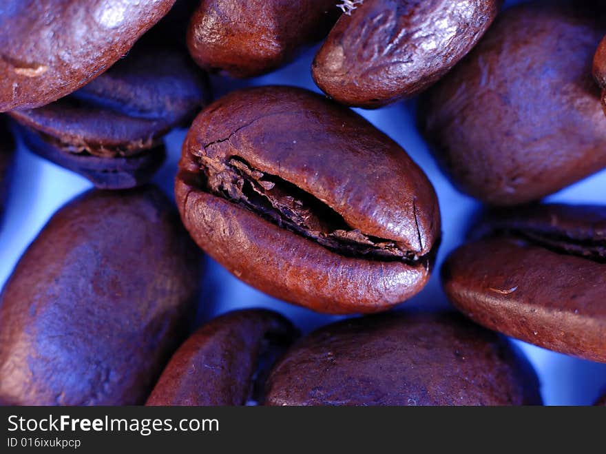 A studio shot series related to coffee - roasted beans with various cups and different backgrounds