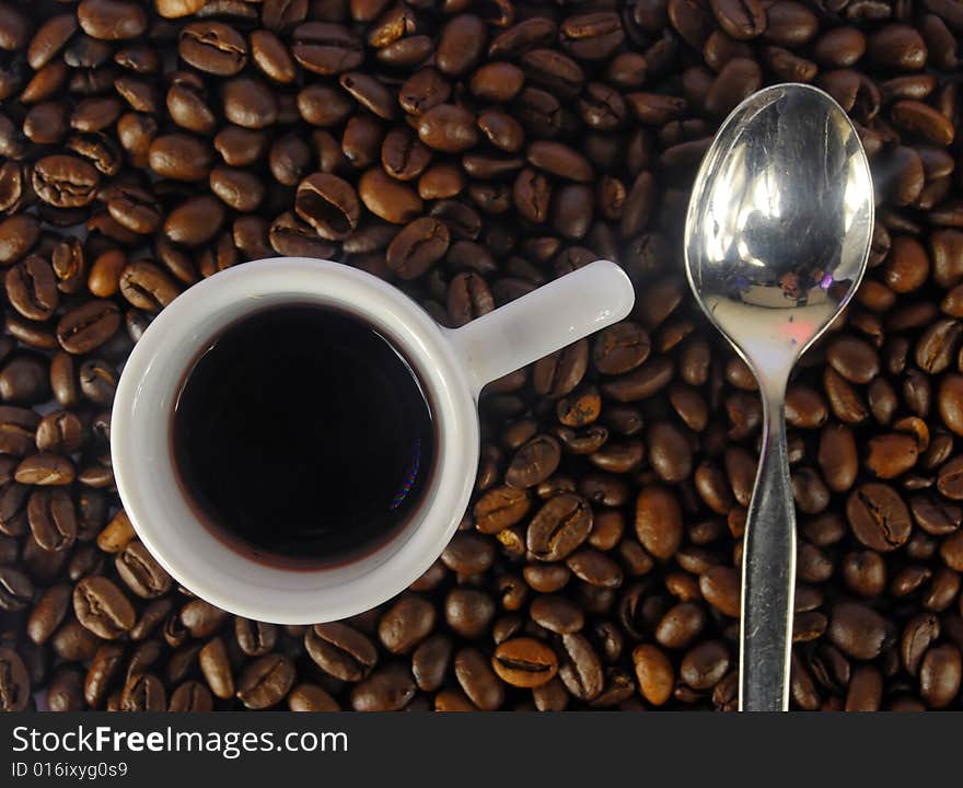 A studio shot series related to coffee - roasted beans with various cups and different backgrounds