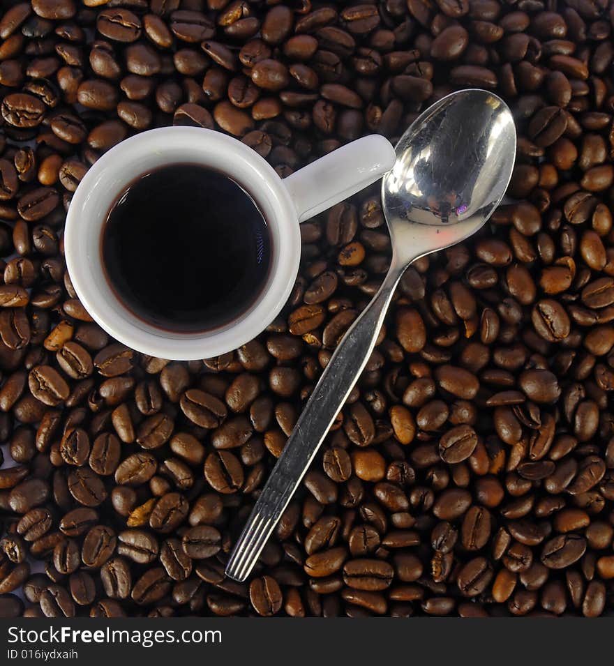 A studio shot series related to coffee - roasted beans with various cups and different backgrounds