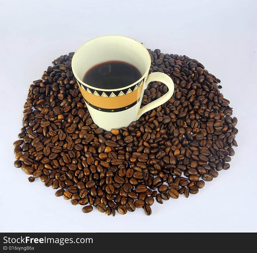 A studio shot series related to coffee - roasted beans with various cups and different backgrounds