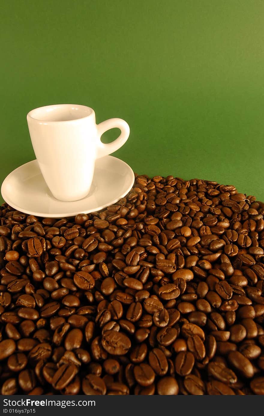 A studio shot series related to coffee - roasted beans with various cups and different backgrounds