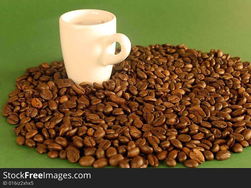 A studio shot series related to coffee - roasted beans with various cups and different backgrounds