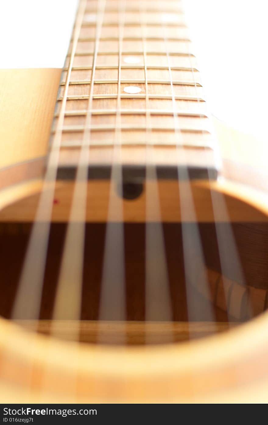 Guitar laying on white background. Guitar laying on white background