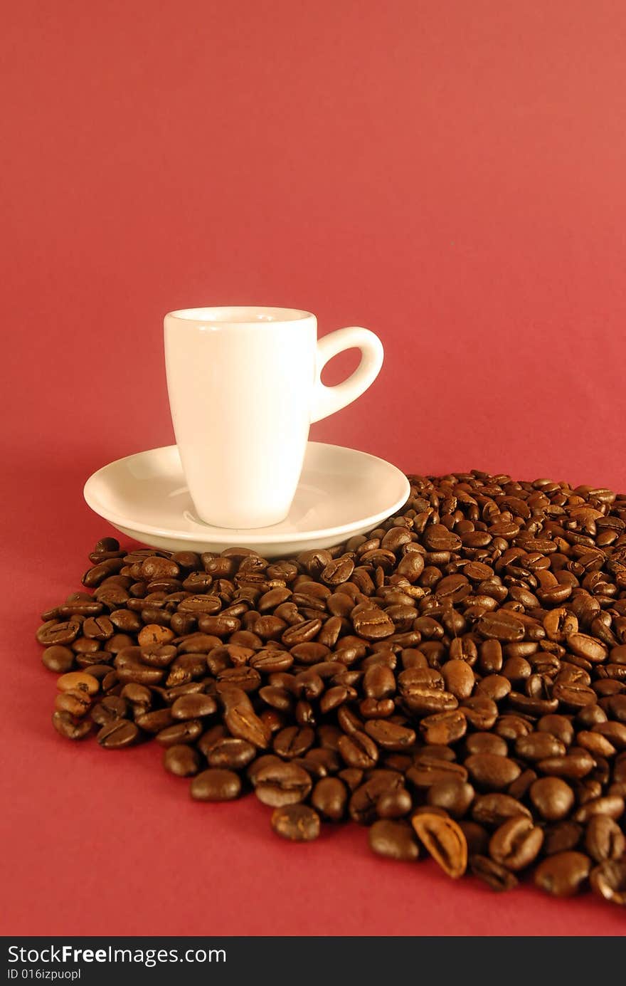 A studio shot series related to coffee - roasted beans with various cups and different backgrounds