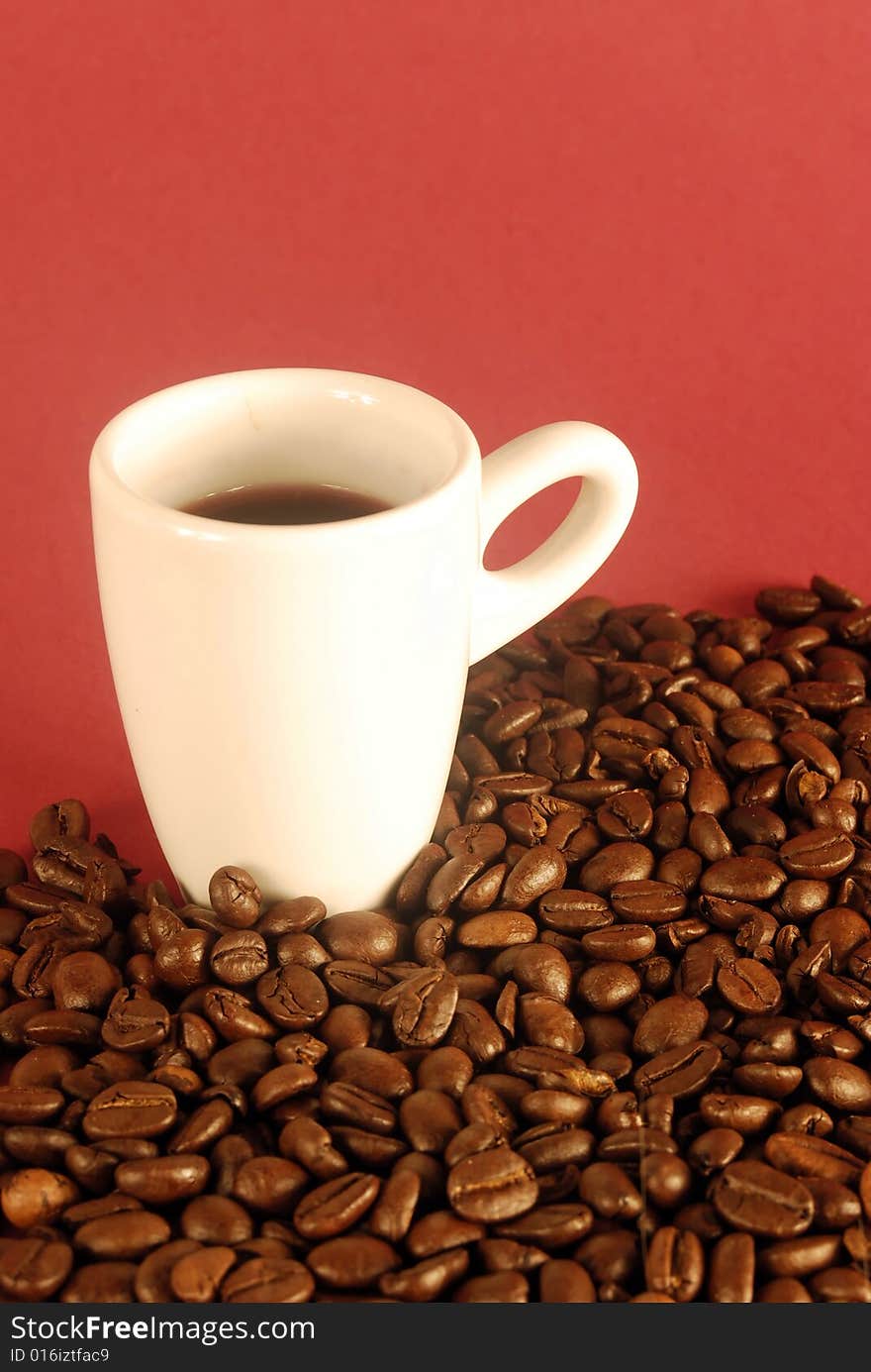 A studio shot series related to coffee - roasted beans with various cups and different backgrounds