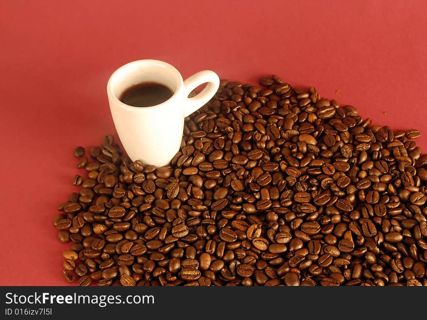 A studio shot series related to coffee - roasted beans with various cups and different backgrounds