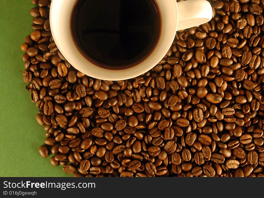 A studio shot series related to coffee - roasted beans with various cups and different backgrounds