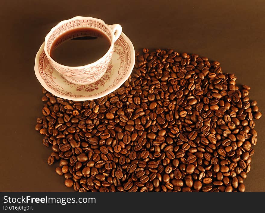 A studio shot series related to coffee - roasted beans with various cups and different backgrounds